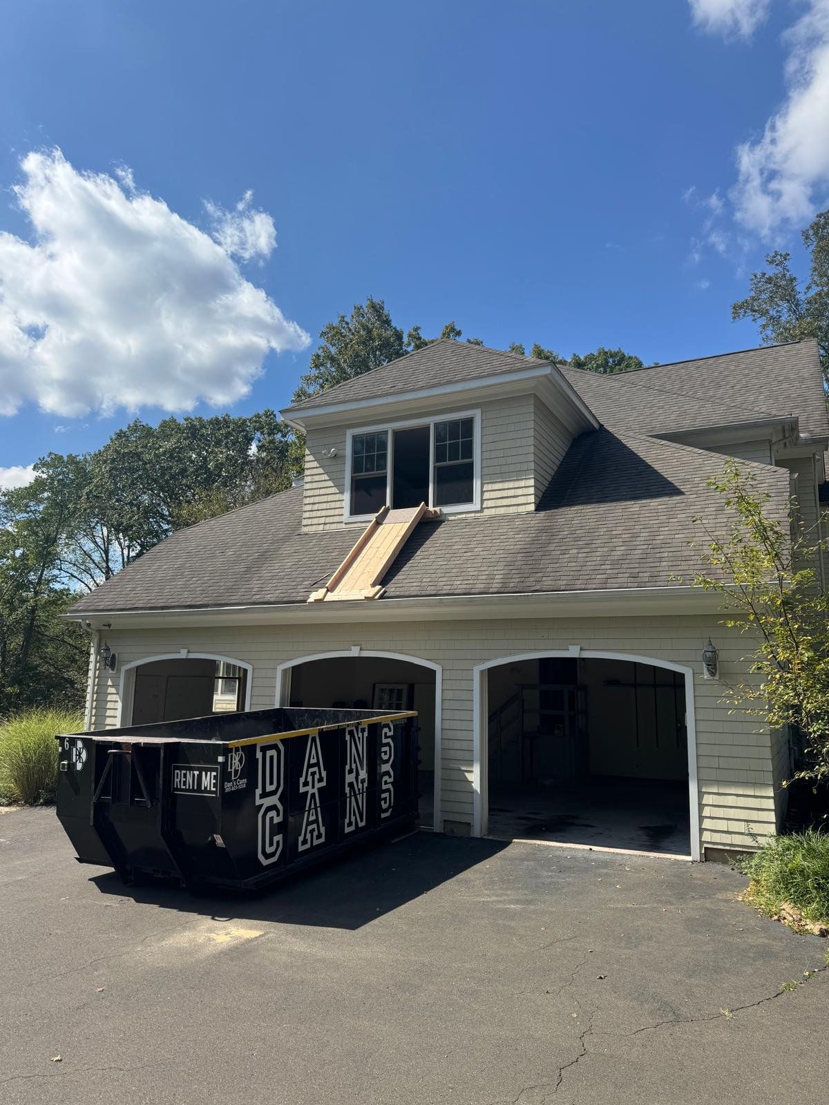 Dans Cans dumpster pickup after a completed Connecticut cleanup job